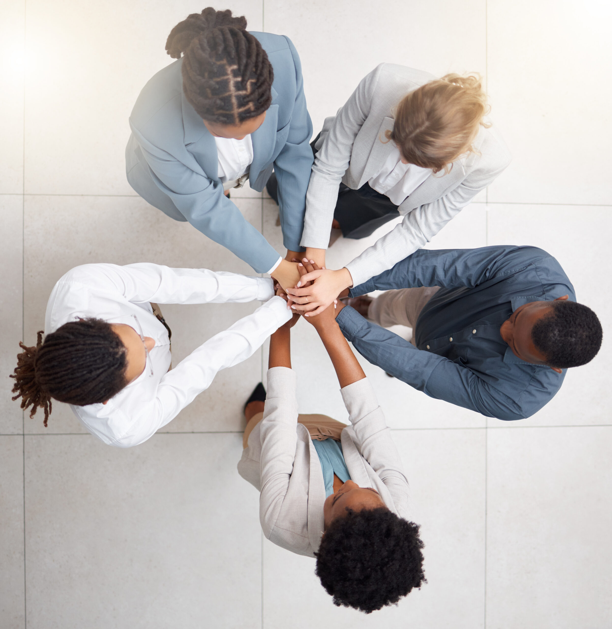 hands-stack-business-people-and-team-building-of-2023-11-27-05-29-56-utc-scaled.jpg