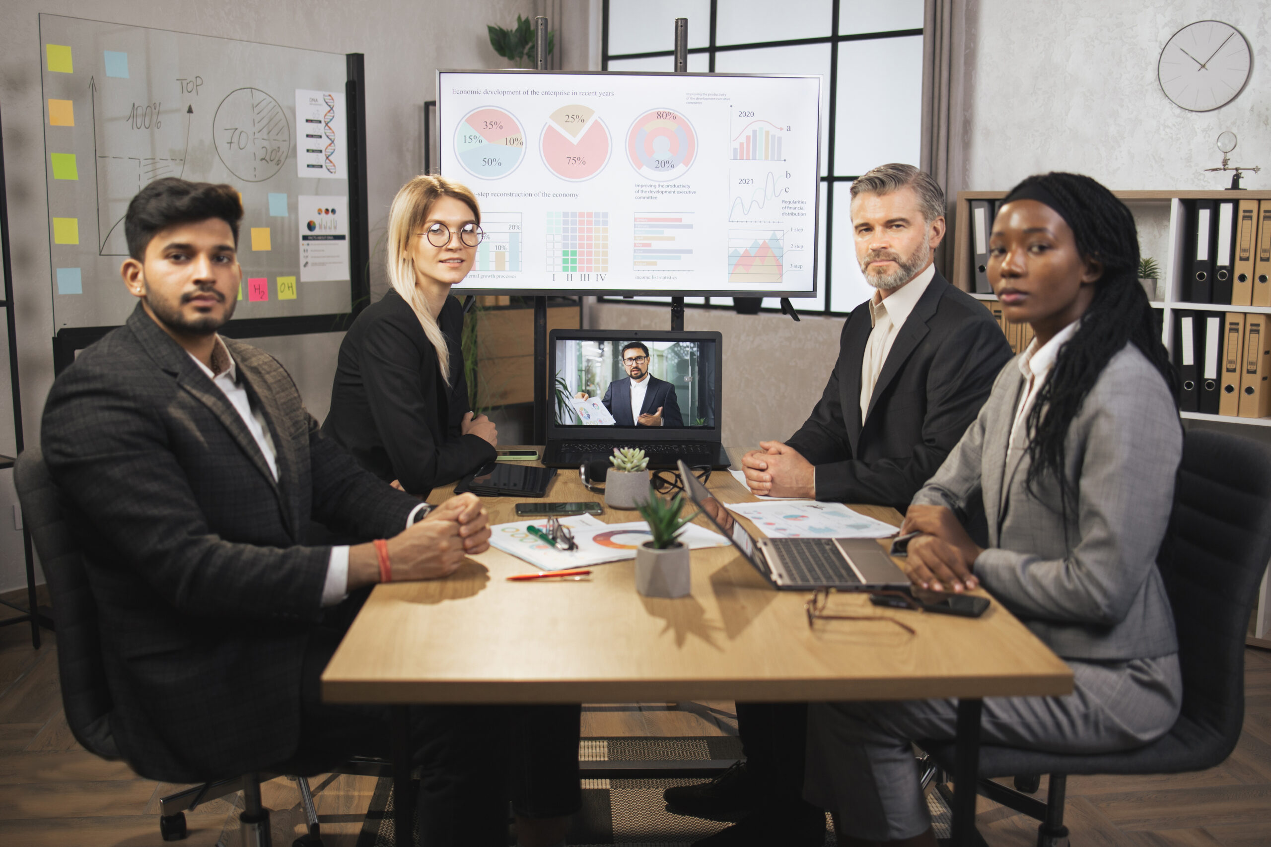 skillful-businesspeople-looking-at-the-camera-whil-2024-12-13-00-56-15-utc-scaled.jpg